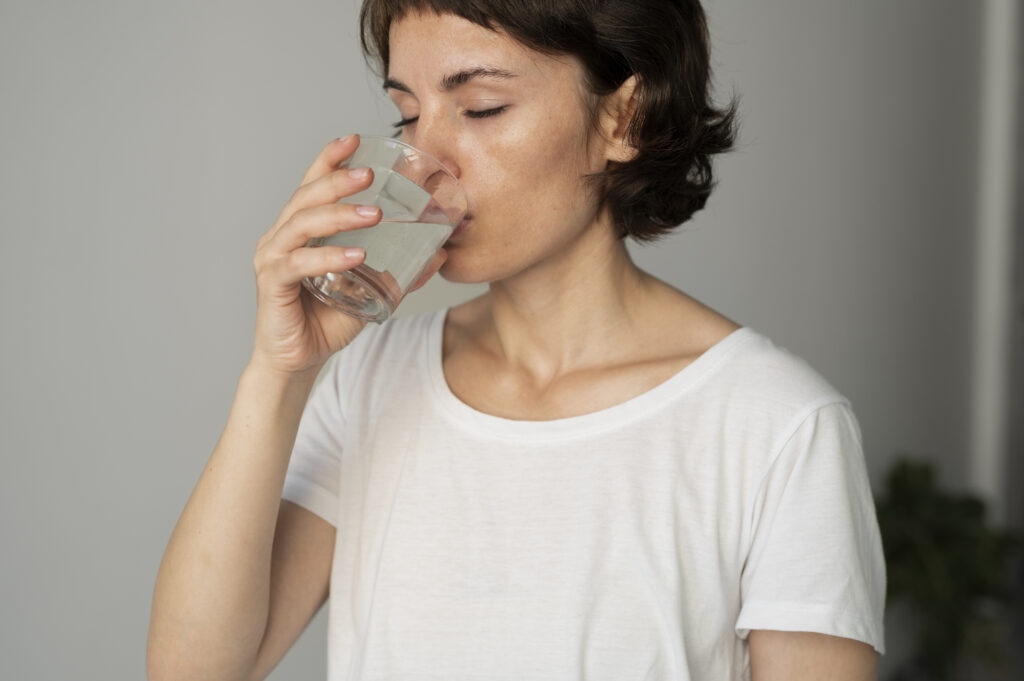 Close Up Woman Drinking Water