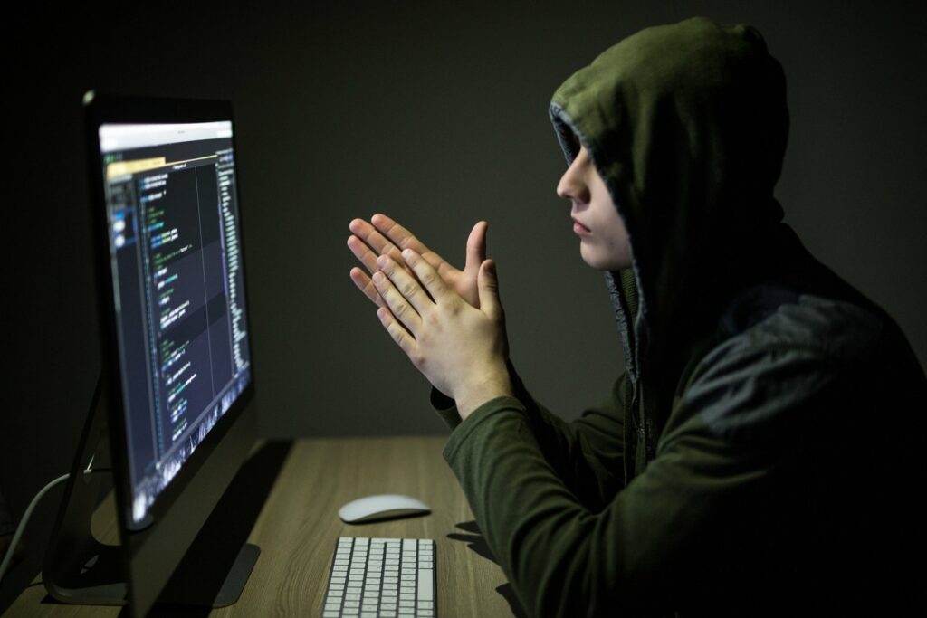1617961042 Bigstock Hacker In Glasses Breaking Cod 235251397